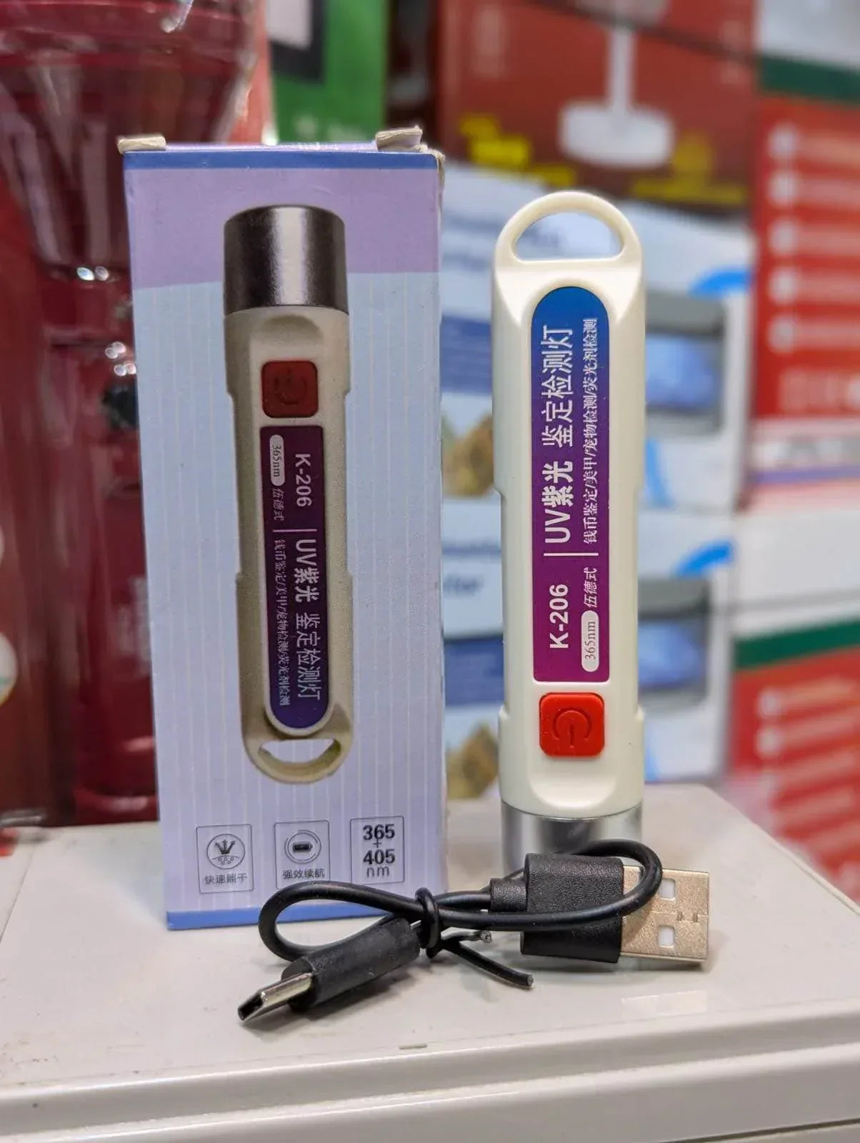 Handheld LED Money Detector, Currency Detector Violet Torch Lamp Counterfeit Fake Banknotes Cash Checker 
Model: JC-205 - Arfa Mart